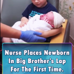 Newborn In his Brother’s Lap