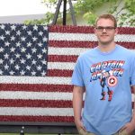 Teen creates US flag with toy soldiers