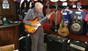 old man with guitar skills, guitar talent, guitar performance, age is just a number, best guitar shop in USA, cheapest guitar shop in USA