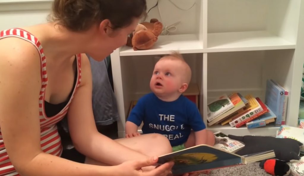 baby, mom, reading a story, emotional reaction, crying, video, heartwarming, bond, tender moments