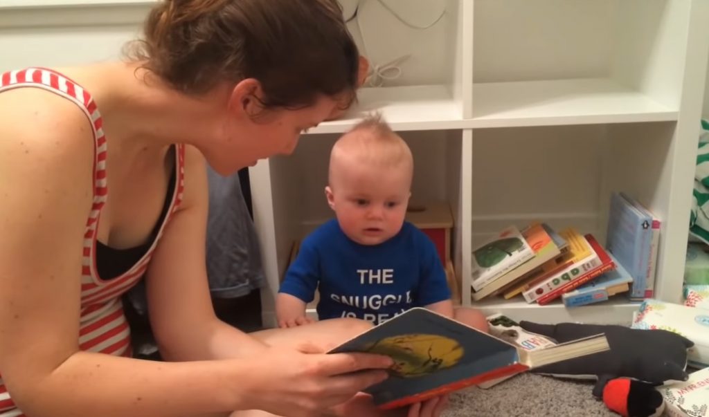 baby, mom, reading a story, emotional reaction, crying, video, heartwarming, bond, tender moments