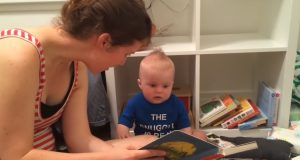 baby, mom, reading a story, emotional reaction, crying, video, heartwarming, bond, tender moments
