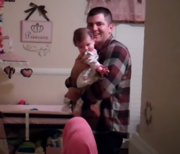 silly daddy singing, busted father baby, dad caught singing, viral singing dad, funny family moment, singing to his baby, parents' bonding with child, humorous parenting, baby listening to dad, dad's impromptu concert