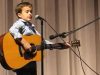 Guitar Prodigy, Little Johnny Cash, Folsom Prison Rendition, Guitar Performance, Second Grader Talent, School Concert, Talented Kids, Future of Music, Budding Star, Unique Guitar Talent.