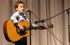 Guitar Prodigy, Little Johnny Cash, Folsom Prison Rendition, Guitar Performance, Second Grader Talent, School Concert, Talented Kids, Future of Music, Budding Star, Unique Guitar Talent.