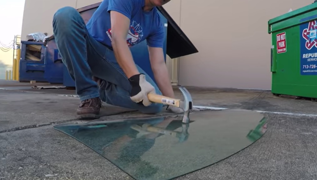 tempered glass, non-tempered glass, durability, strength, safety glass, slow-motion footage, experiment, high-quality camera, shattering, concrete floor, automobile, injury, accident.