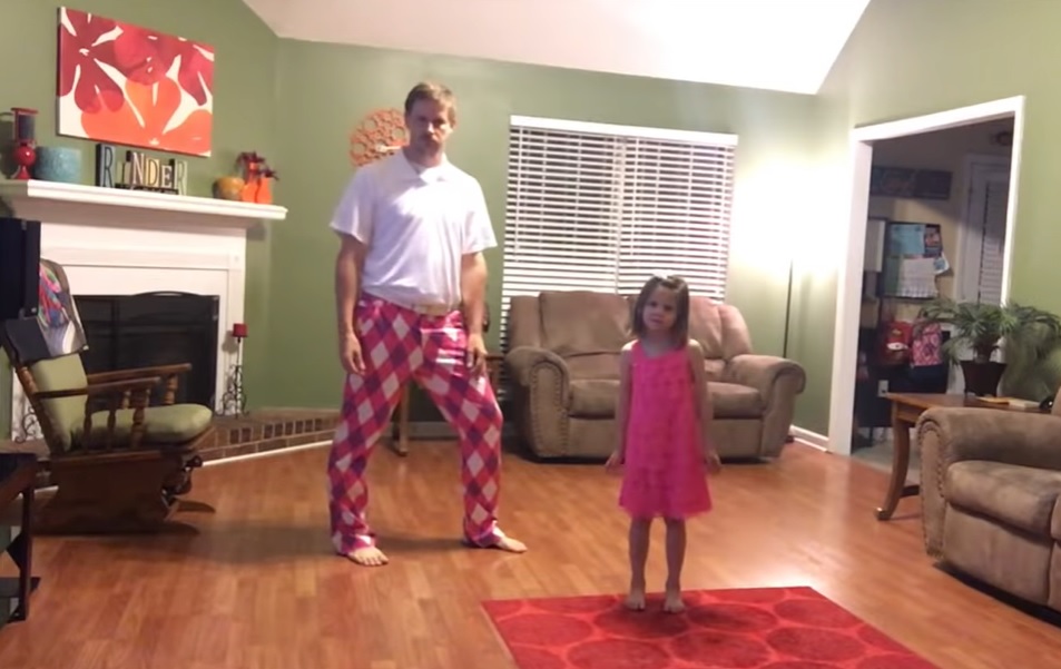 father-daughter dance, Justin Timberlake's “Can’t Stop the Feeling”, epic dance, family bonding, choreography, joy of dancing, matching outfits, heartwarming story, energy and love, contagious happiness