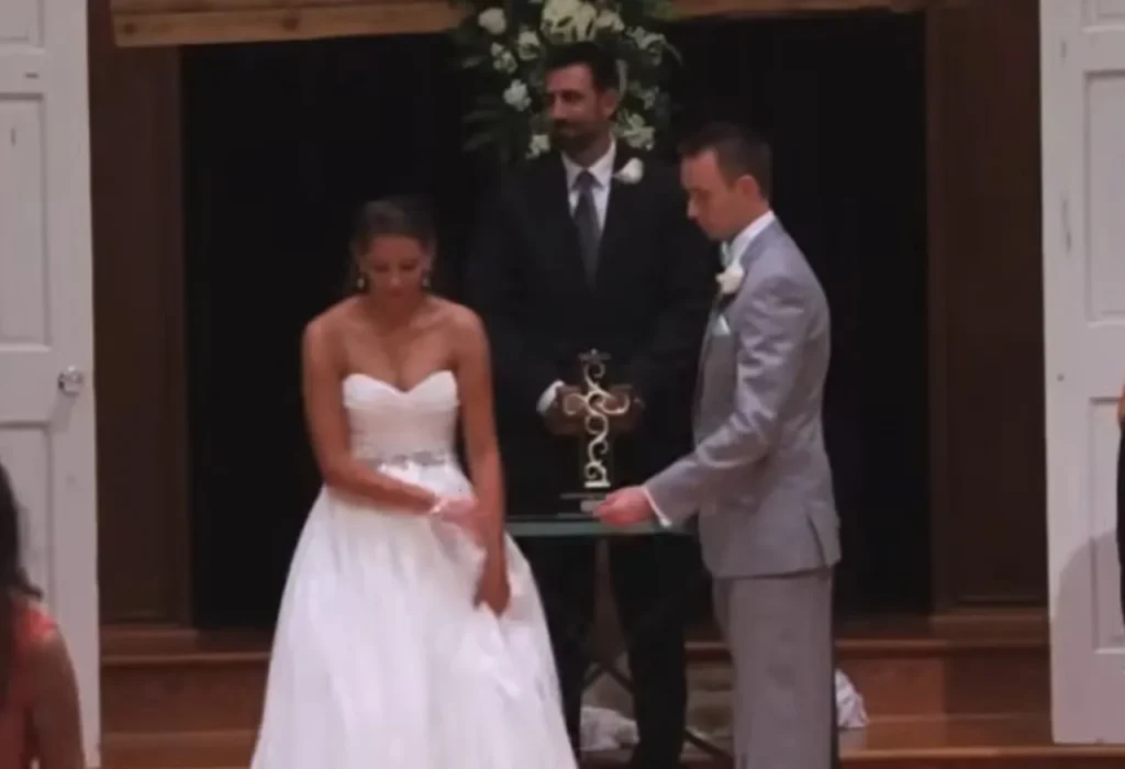 ASL wedding surprise, American Sign Language, bride surprises groom, emotional wedding performance, ASL love story, unique wedding moment