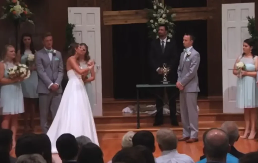 ASL wedding surprise, American Sign Language, bride surprises groom, emotional wedding performance, ASL love story, unique wedding moment