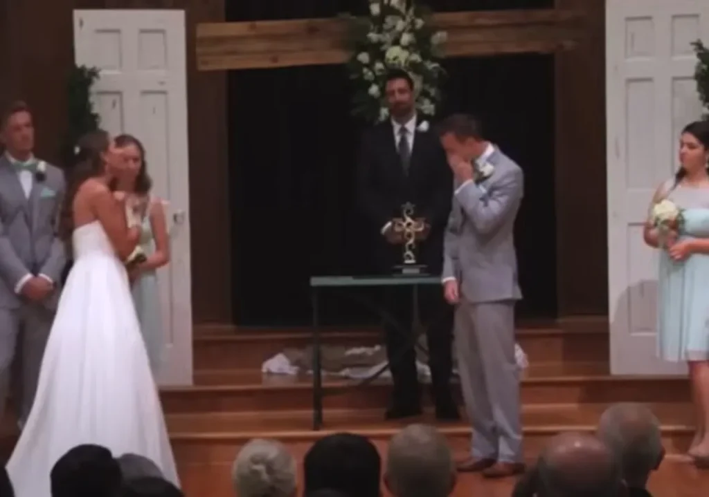 ASL wedding surprise, American Sign Language, bride surprises groom, emotional wedding performance, ASL love story, unique wedding moment