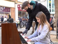 street performance, public piano, overcoming stage fright, Joe Jenkins, young pianist, street pianist, building confidence, calming techniques, street crowd, music performance, breathing exercises, visualization, managing nerves, YouTube pianist, piano performance