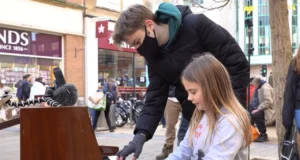 street performance, public piano, overcoming stage fright, Joe Jenkins, young pianist, street pianist, building confidence, calming techniques, street crowd, music performance, breathing exercises, visualization, managing nerves, YouTube pianist, piano performance