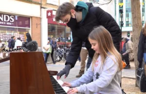 street performance, public piano, overcoming stage fright, Joe Jenkins, young pianist, street pianist, building confidence, calming techniques, street crowd, music performance, breathing exercises, visualization, managing nerves, YouTube pianist, piano performance