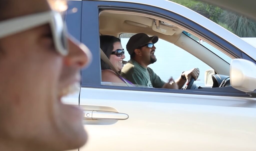 Highway Sing-A-Long, TJ Smith, Build Me Up Buttercup, Commuter Joy, Spreading Positivity, Roadside Serenade, Music and Unity, Viral YouTube Series, Daily Commute Happiness, Social Media Impact