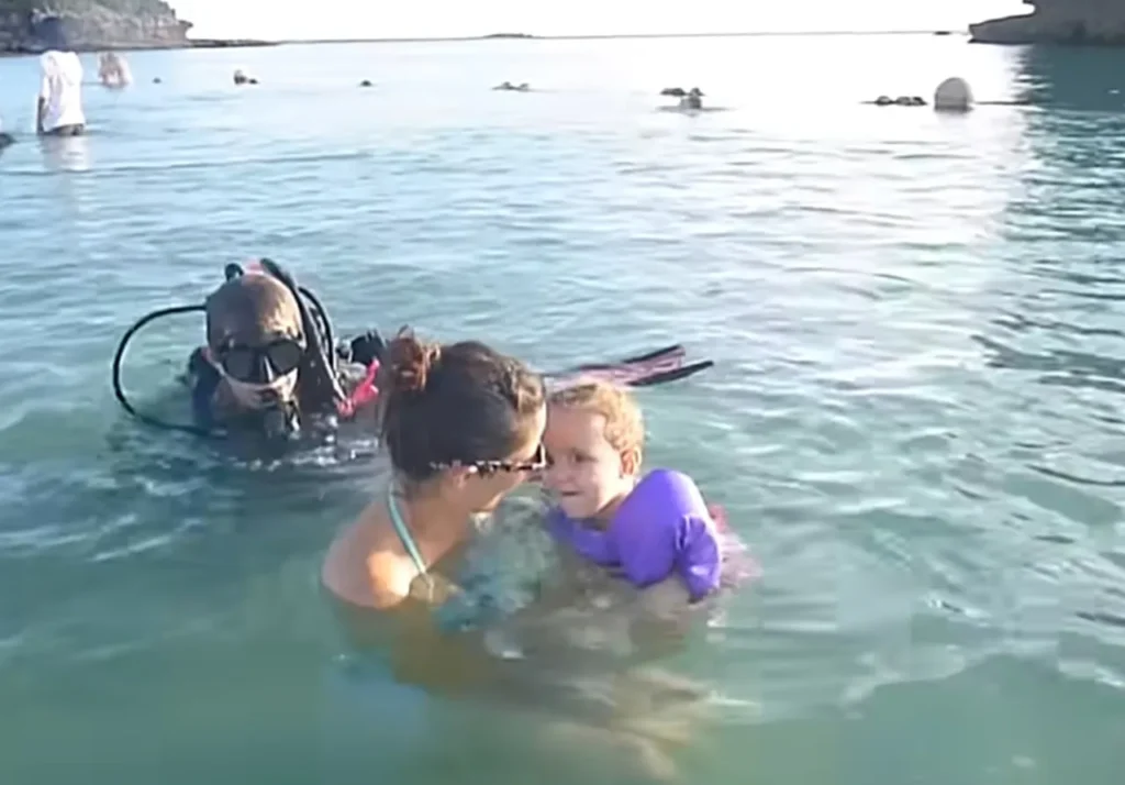 Military Homecoming Surprise, Scuba Soldier's Return, Afghanistan Veteran Reunion, Emotional Military Family Reunion, Surprise Soldier Homecoming, Beach Family Reunion Story, Veteran's Unexpected Visit, Military Dad Returns Home, Soldier's Surprise Beach Reunion, Heartwarming Military Return