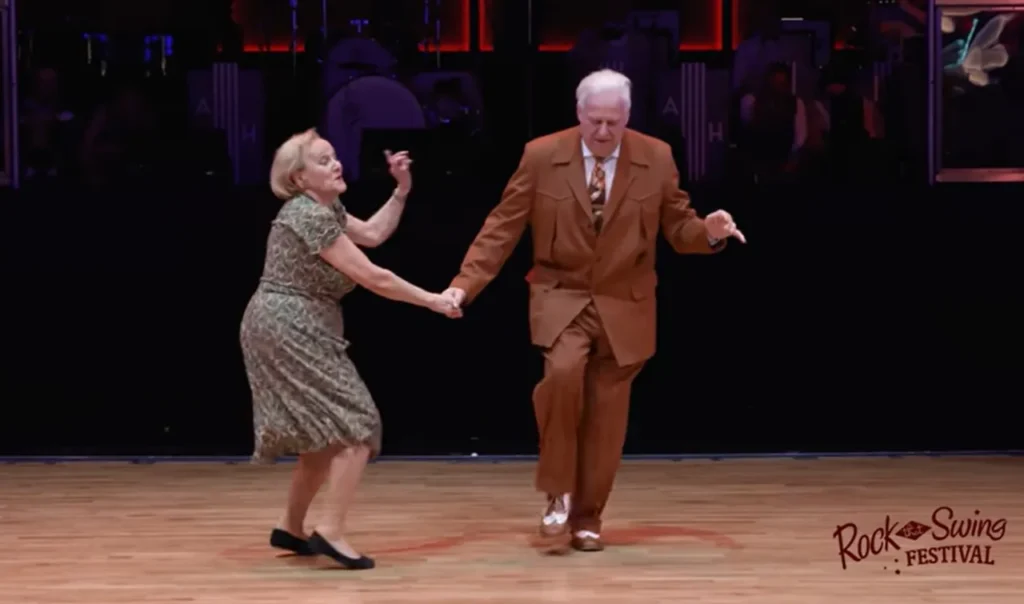 Dietmar & Nellia, Senior dance duo, Rock That Swing Ball 2020, Rockabilly jive, Boogie woogie, Energetic senior dancers, Comedy and dance fusion, Inspirational elderly performers, Ageless agility, Active senior citizens, Swing dance, SNL-style dance skit, Passion for dance at any age, Humor and agility in dance, Unforgettable performance