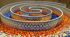 15,000 dominoes, Triple spiral, Domino art, Hevesh5, Domino chain reaction, Hypnotic domino fall, Domino masterpiece, Creative domino design, Domino artist, 25 hours setup