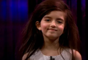 Angelina Jordan, 7-year-old singer, Fly Me to the Moon, Senkveld performance, Norway’s Got Talent winner, Incredible vocal talent, Jazz classic cover, Young musical prodigy, Old soul voice, Acoustic guitar performance