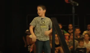 Soldier surprises son, Emotional military reunion, School surprise event, Military family reunion, Surprise homecoming, Mason Elementary End of Year, Staff Sgt. Luis Bratic, Father-son reunion, 11 months apart, Tearful reunion