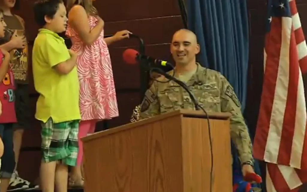 Soldier surprises son, Emotional military reunion, School surprise event, Military family reunion, Surprise homecoming, Mason Elementary End of Year, Staff Sgt. Luis Bratic, Father-son reunion, 11 months apart, Tearful reunion