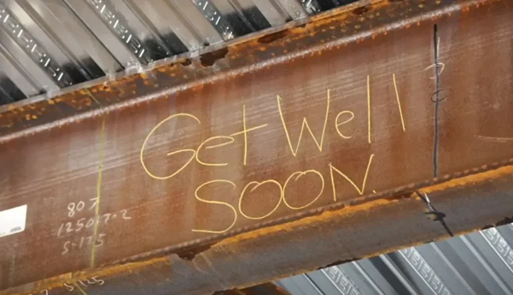 Construction workers, get well message, St. Louis Children's Hospital, Vivian Keith, toddler with cancer, heartfelt gesture, uplifting story, simple act of kindness, cancer battle, building hope, inspiring story, hospital window, worker’s note, small gesture big impact, cancer support