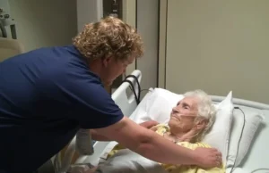Singing Nurse Valencia Hospital, Jared the Singing Nurse, Music therapy in hospitals, Hospice care with music, Healing power of music, Nurse uses singing for care, Emotional support through music, Holistic patient care, Compassionate nursing with music, Music and patient well-being