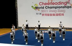Team Japan cheerleading, World Cheerleading Championships 2011, All-female squad, Incredible routine, Perfect synchronization, Strength and agility, Unbelievable performance, Human pyramid, Defying gravity, Cirque du Soleil-level stunts