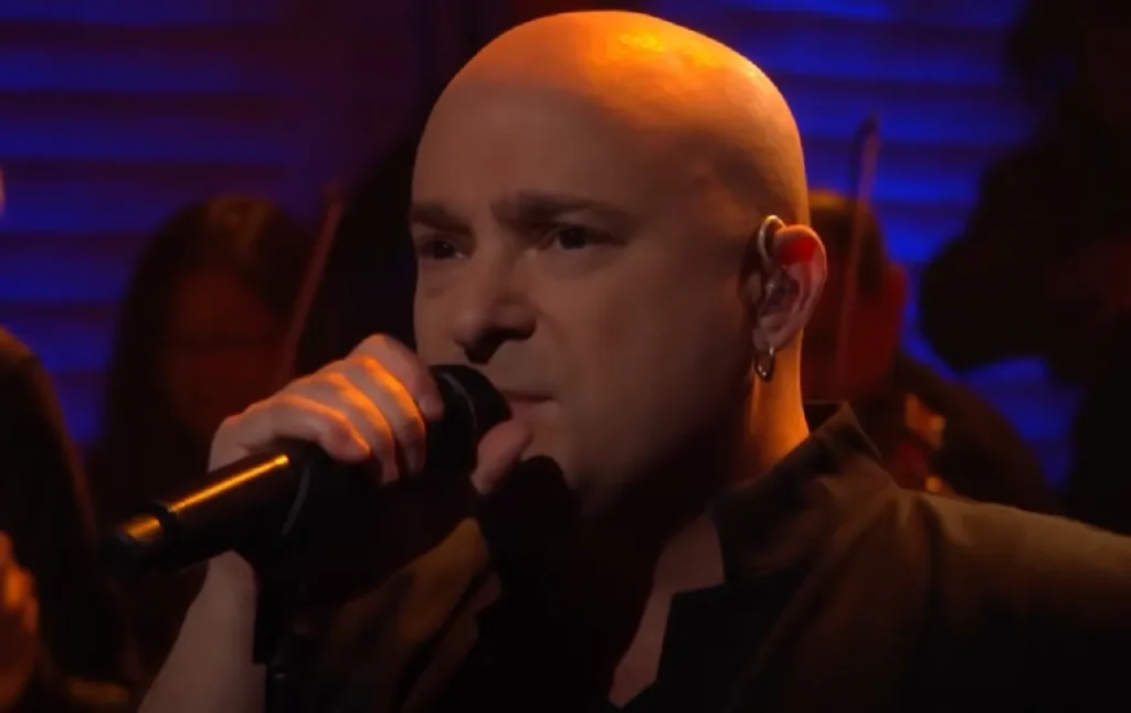 Disturbed Sound of Silence, Simon & Garfunkel classic, heavy metal covers, Disturbed Immortalized album, CONAN on TBS performance, classic song covers, Disturbed band history, emotional song renditions, Disturbed awards, Billboard Mainstream Rock chart