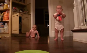Twin babies, marshmallow feast, viral videos, parenting joys, cute toddler moments, sibling bond, simple pleasures, family life, parenting chaos, heartwarming stories