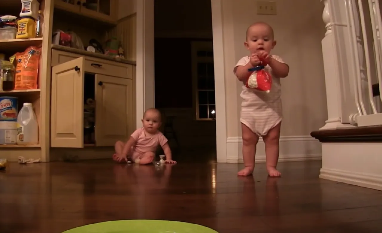 Twin babies, marshmallow feast, viral videos, parenting joys, cute toddler moments, sibling bond, simple pleasures, family life, parenting chaos, heartwarming stories