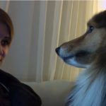 She turns on the webcam in front of her dog