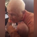 105-Yr-Old Holds Great-Grandson