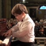 Accompanied by His Teddy bear This kid came to play Beethoven