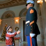 This little kid gives his Christmas List to the Silent Marine