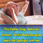 This father sings National Anthem with his baby girl