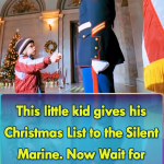 This little kid gives his Christmas List to the Silent Marine
