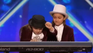 Elias and Zion, incredible piano skills, America's Got Talent 2016, twin brothers, musical prodigies, classical music, Simon Cowell, child prodigies, stage presence, humor, long blonde hair, Judge Cuts, The Ellen DeGeneres Show, talent discovery, versatile performers
