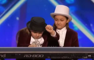 Elias and Zion, incredible piano skills, America's Got Talent 2016, twin brothers, musical prodigies, classical music, Simon Cowell, child prodigies, stage presence, humor, long blonde hair, Judge Cuts, The Ellen DeGeneres Show, talent discovery, versatile performers