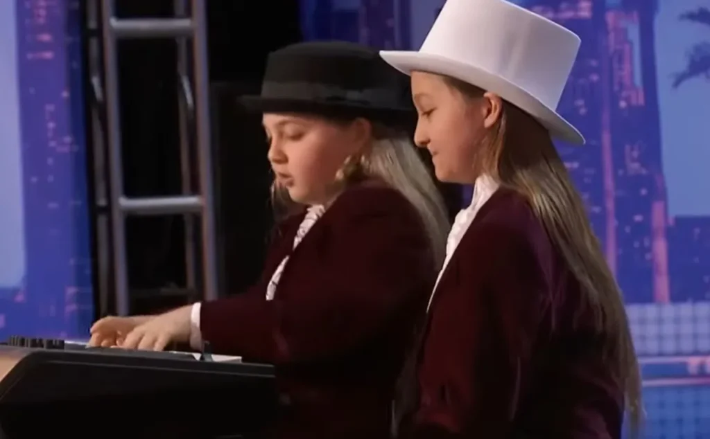 Elias and Zion, incredible piano skills, America's Got Talent 2016, twin brothers, musical prodigies, classical music, Simon Cowell, child prodigies, stage presence, humor, long blonde hair, Judge Cuts, The Ellen DeGeneres Show, talent discovery, versatile performers