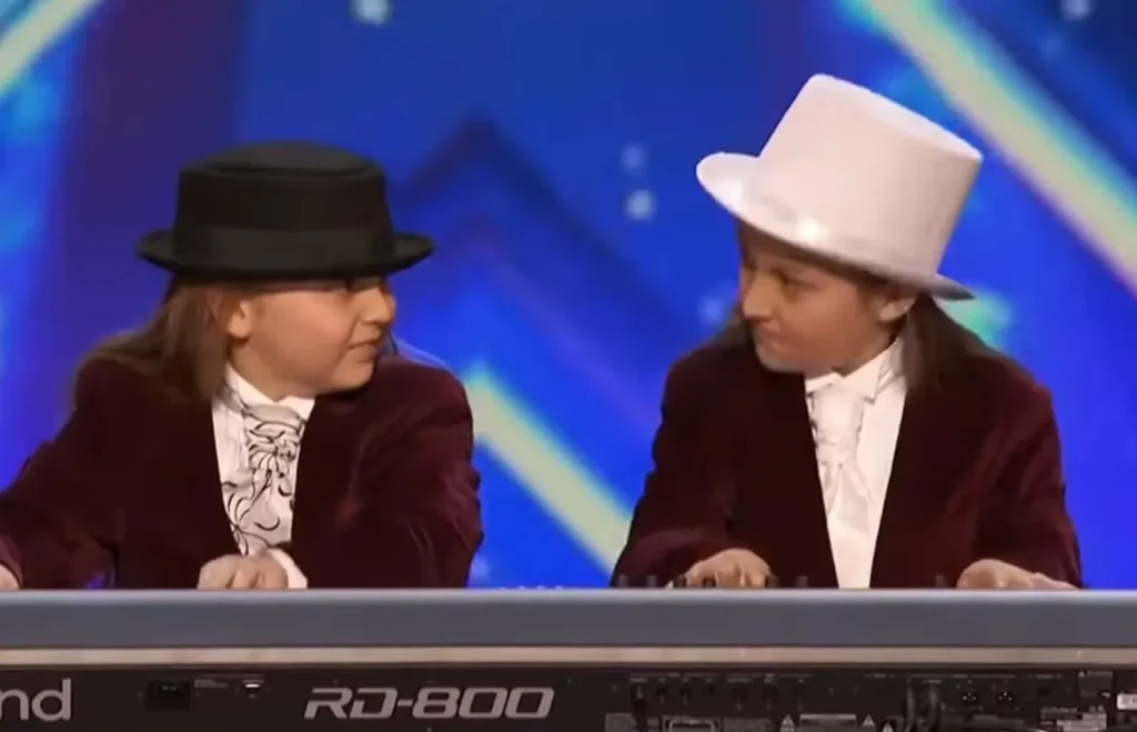 Elias and Zion, incredible piano skills, America's Got Talent 2016, twin brothers, musical prodigies, classical music, Simon Cowell, child prodigies, stage presence, humor, long blonde hair, Judge Cuts, The Ellen DeGeneres Show, talent discovery, versatile performers