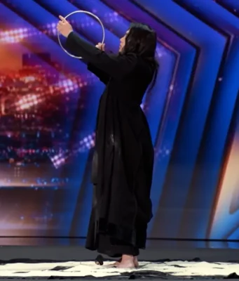Young Min sand magic, AGT 2024 sand magic, sand magic performance, magic with sand, Young Min magician AGT, AGT 2024 magic act, Young Min pulls ring, sandstorm magic act, visual sand magic AGT, Young Min's magic audition.