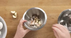 peeling garlic, garlic techniques, garlic preparation, garlic tips, cooking garlic, garlic methods, garlic slicing, garlic crushing, garlic chopping, roasted garlic