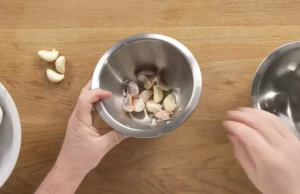 peeling garlic, garlic techniques, garlic preparation, garlic tips, cooking garlic, garlic methods, garlic slicing, garlic crushing, garlic chopping, roasted garlic