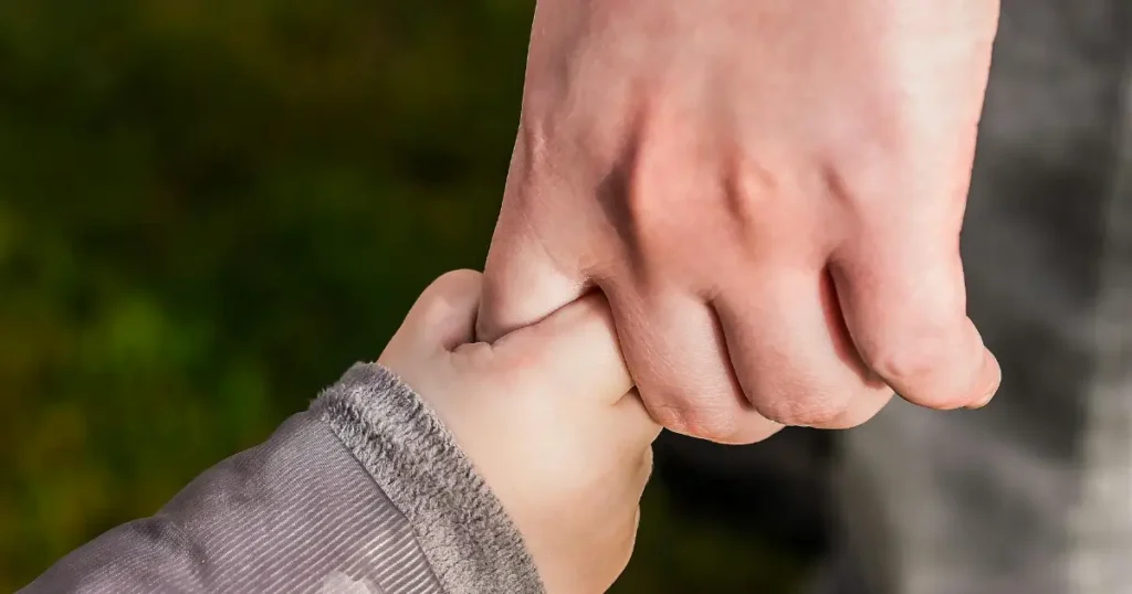 Positive Parenting Checklist, child and parent holding hands
