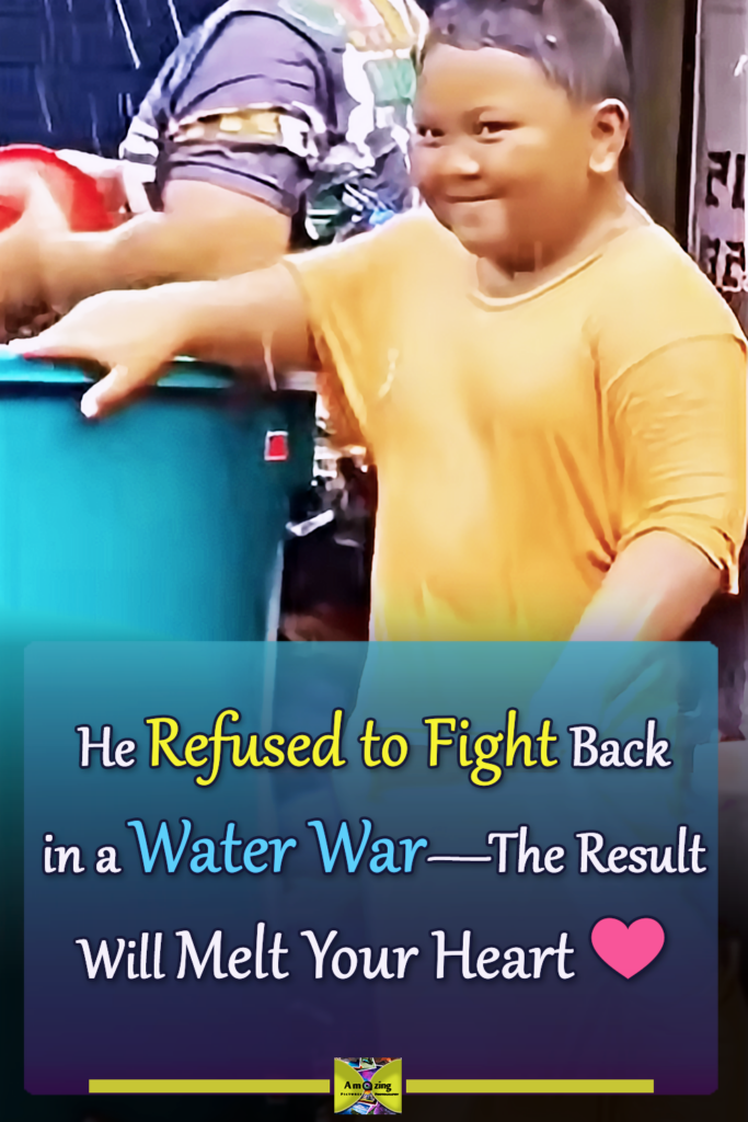 Watch What Happens When the Sweetest Kid Joins a Wild Water Fight