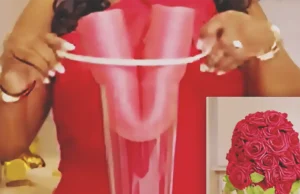 A DIY wedding centerpiece made from a pool noodle and floral materials, styled to look elegant and high end for wedding table decor.