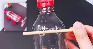 A handmade toy car built from a recycled plastic bottle with wheels and a propeller, shown as an easy DIY craft idea for kids, home projects, or school science activities.