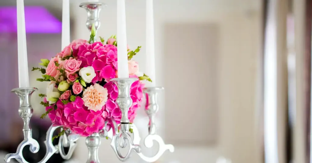 Pin featuring budget-friendly DIY wedding decor ideas that look elegant and expensive, including centerpieces, greenery, floral hoops, candlelight, and affordable wedding styling inspiration.