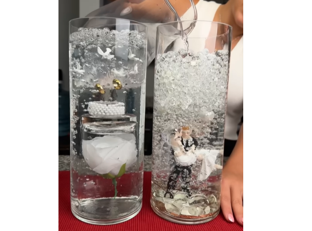 DIY wedding table centerpiece with a simple elegant upgraded look, styled for a romantic reception table with soft florals, candles, and polished wedding decor.