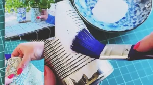 A DIY upcycle craft showing how an old tin can can be transformed into beautiful decorative home decor.